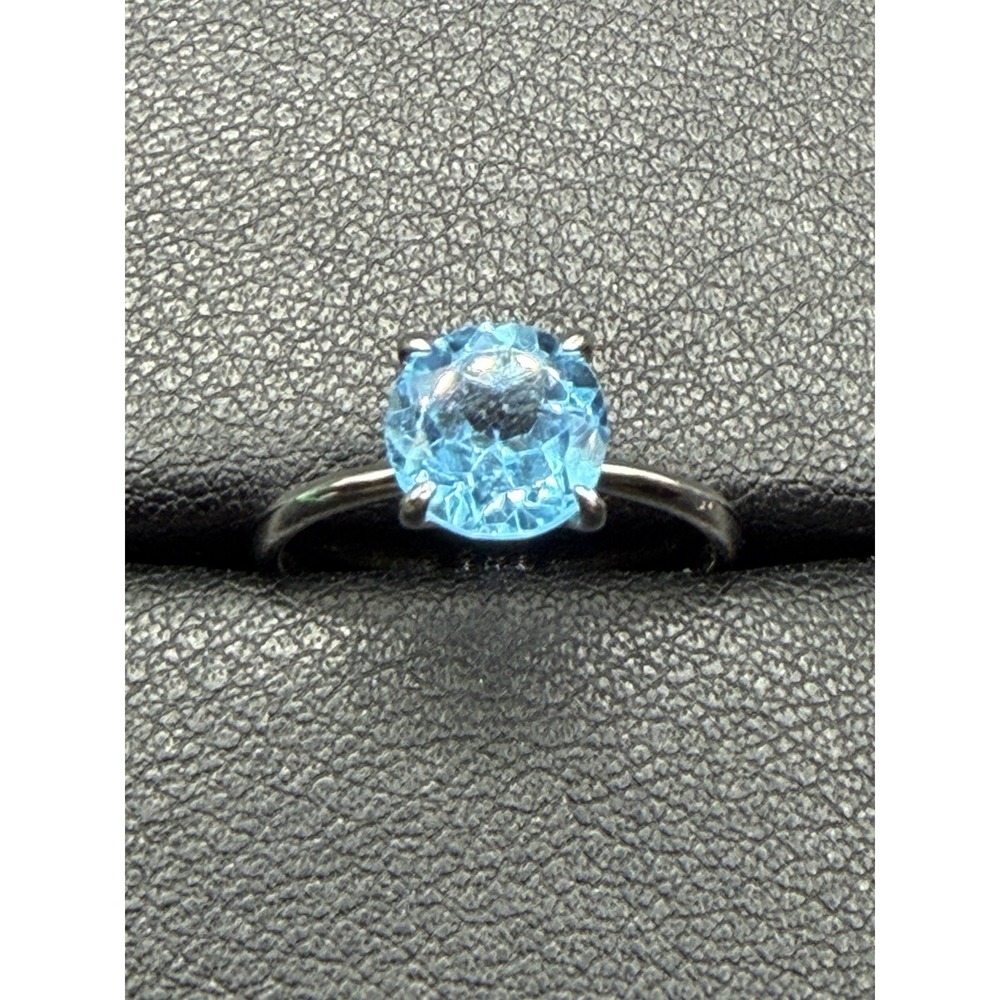 New Condition Sterling Silver Genuine 7.75 mm Blue Topaz Ring Size 7 J16